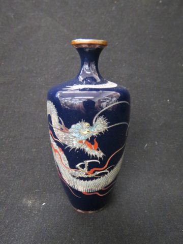 Appraisal: Japanese Cloisonne Vase with Dragonon deep blue field silver wire