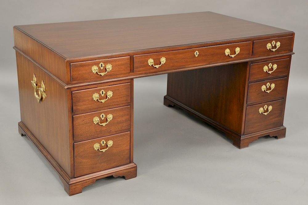 Appraisal: Kittinger mahogany executive partner's kneehole desk with glass top and