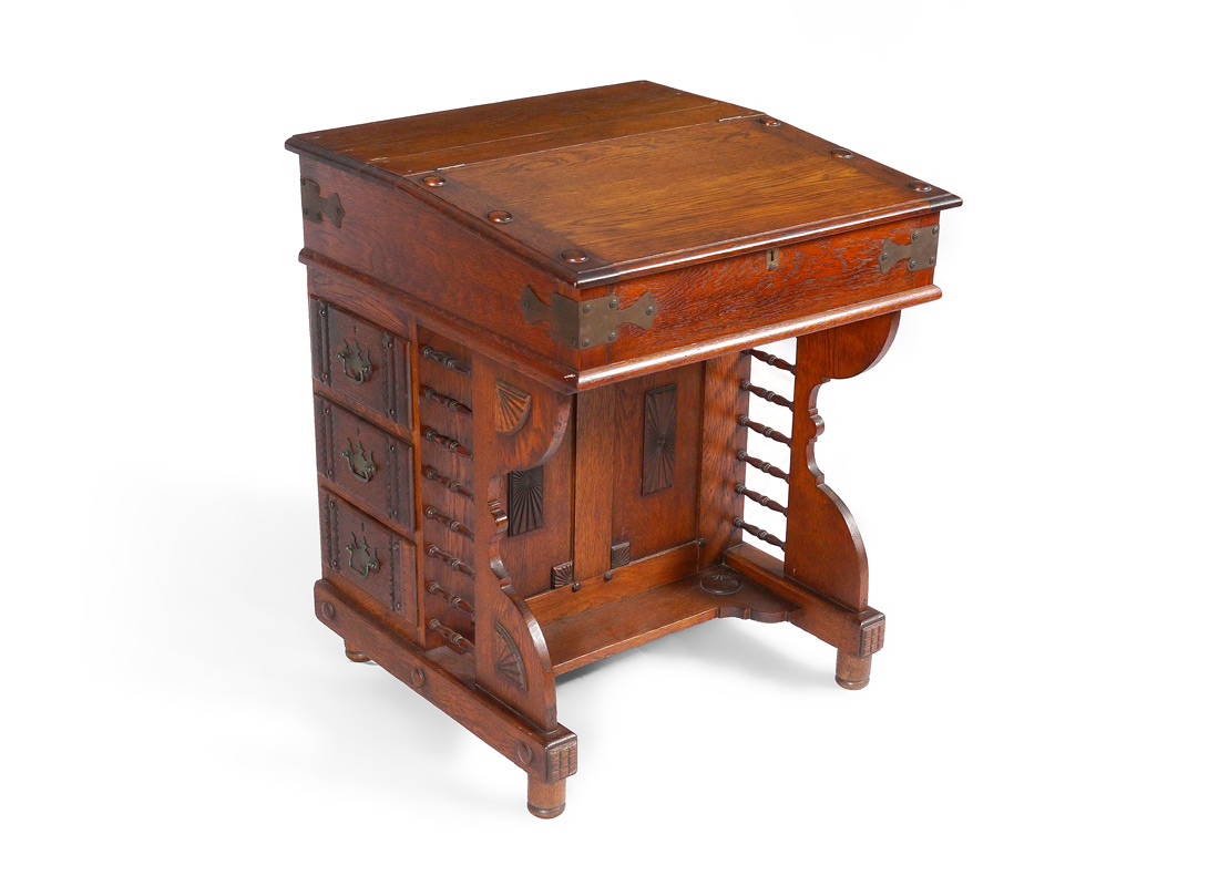 Appraisal: CARVED OAK DAVENPORT DESK Lift top opens to pigeon holes