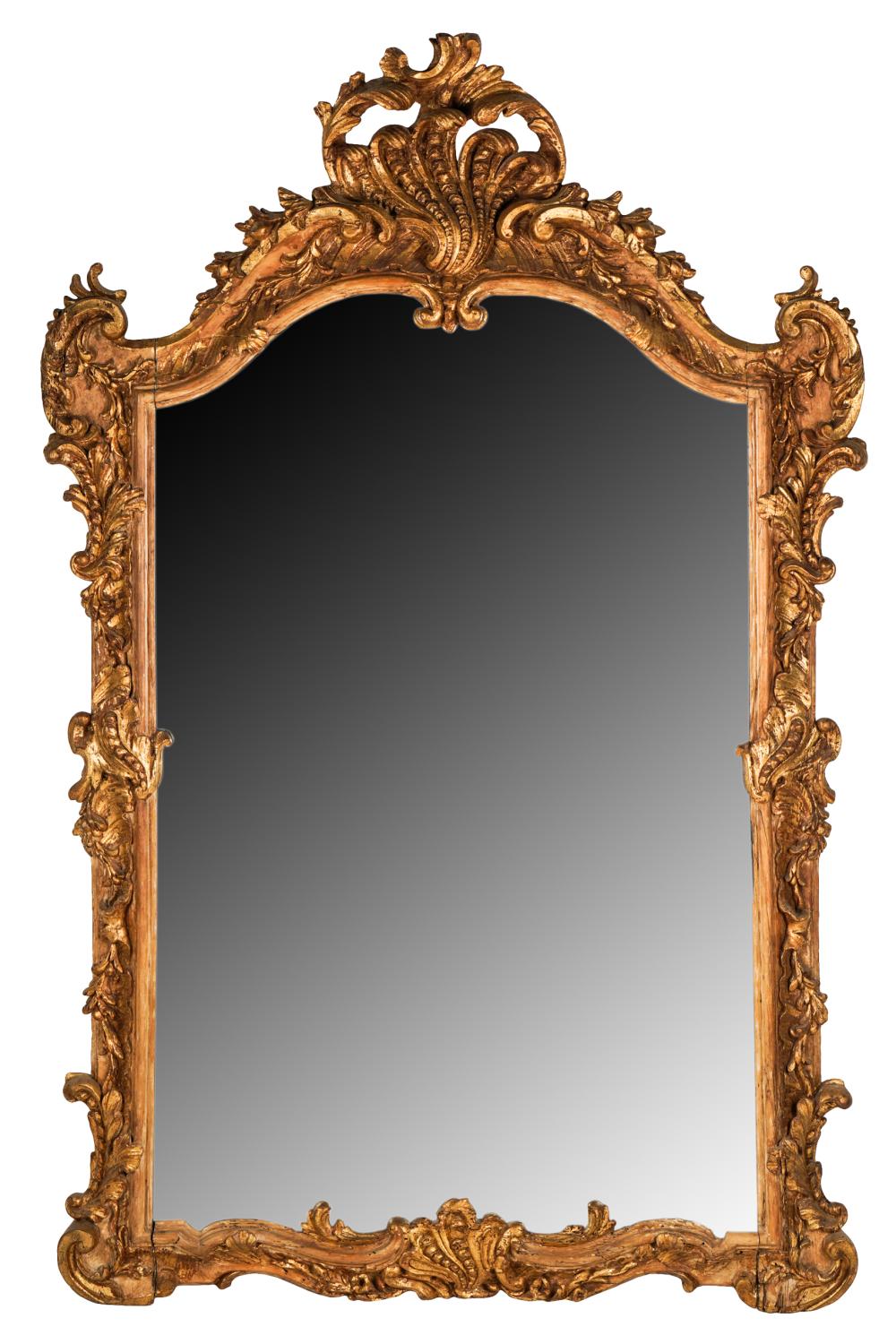 Appraisal: CONTINENTAL ROCOCO CARVED GILTWOOD WALL MIRRORwith flat mirror plates Condition