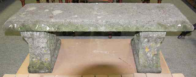 Appraisal: A composition stone seat on leaf carved stands cm long