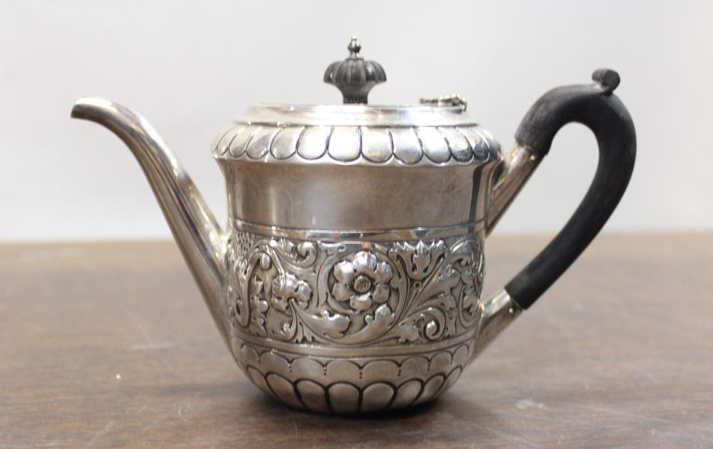 Appraisal: ENGLISH STERLING SILVER TEAPOT with wooden handle hallmarked Sheffield Weight