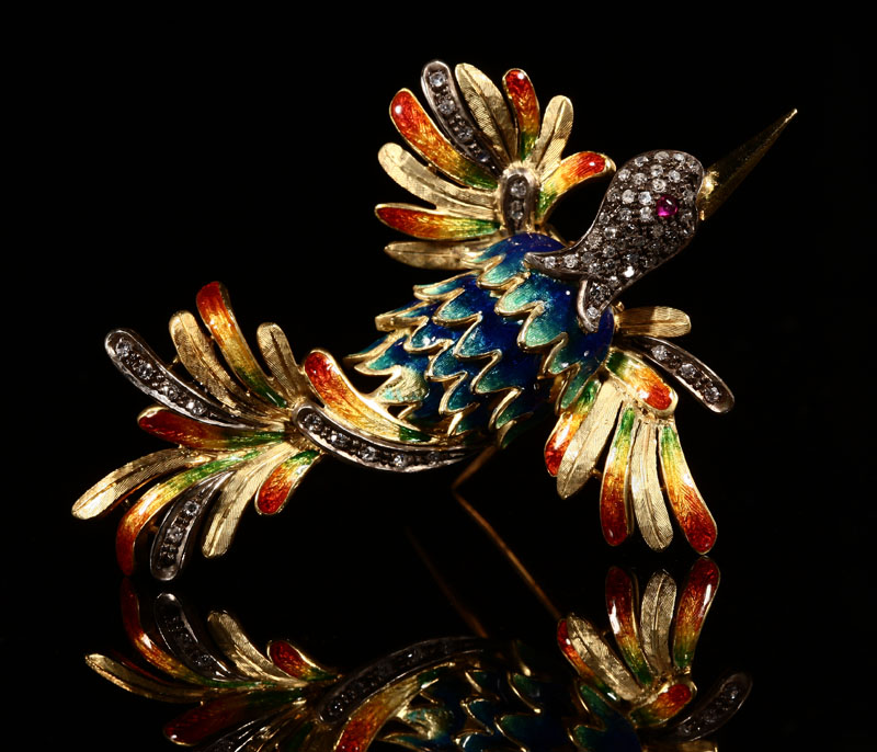 Appraisal: An enamel K yellow gold and diamond bird brooch Designed