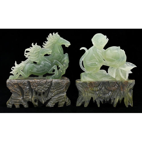 Appraisal: A Chinese jade carving of a monkey and peach cm