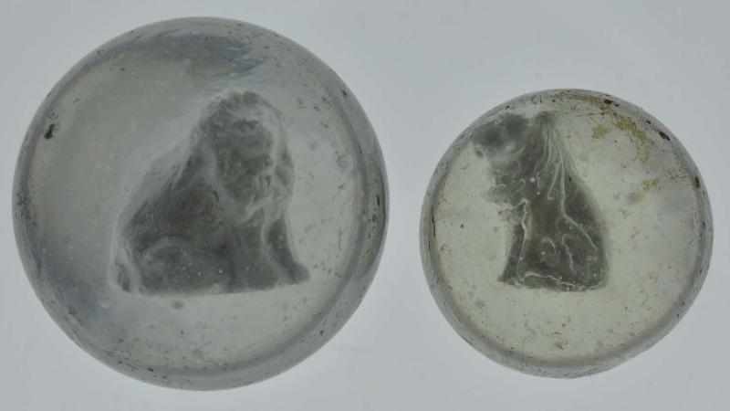 Appraisal: Lot of Seated Lion Sulphide Marbles Description Nice detail and