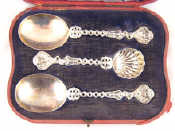 Appraisal: A Late Victorian silver fruit set of two serving spoons