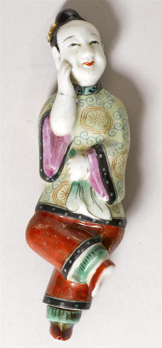 Appraisal: A PAINTED AND GILT SNUFF BOTTLE MODELED AS A LADY