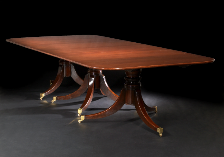 Appraisal: George III-Style Mahogany Dining Table the rounded rectangular top raised