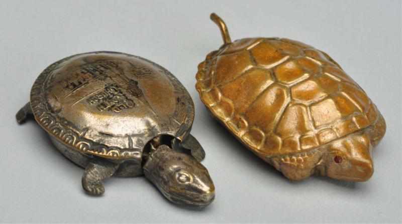 Appraisal: Lot of Turtle Figural Tape Measures Description Brass and silver-plate