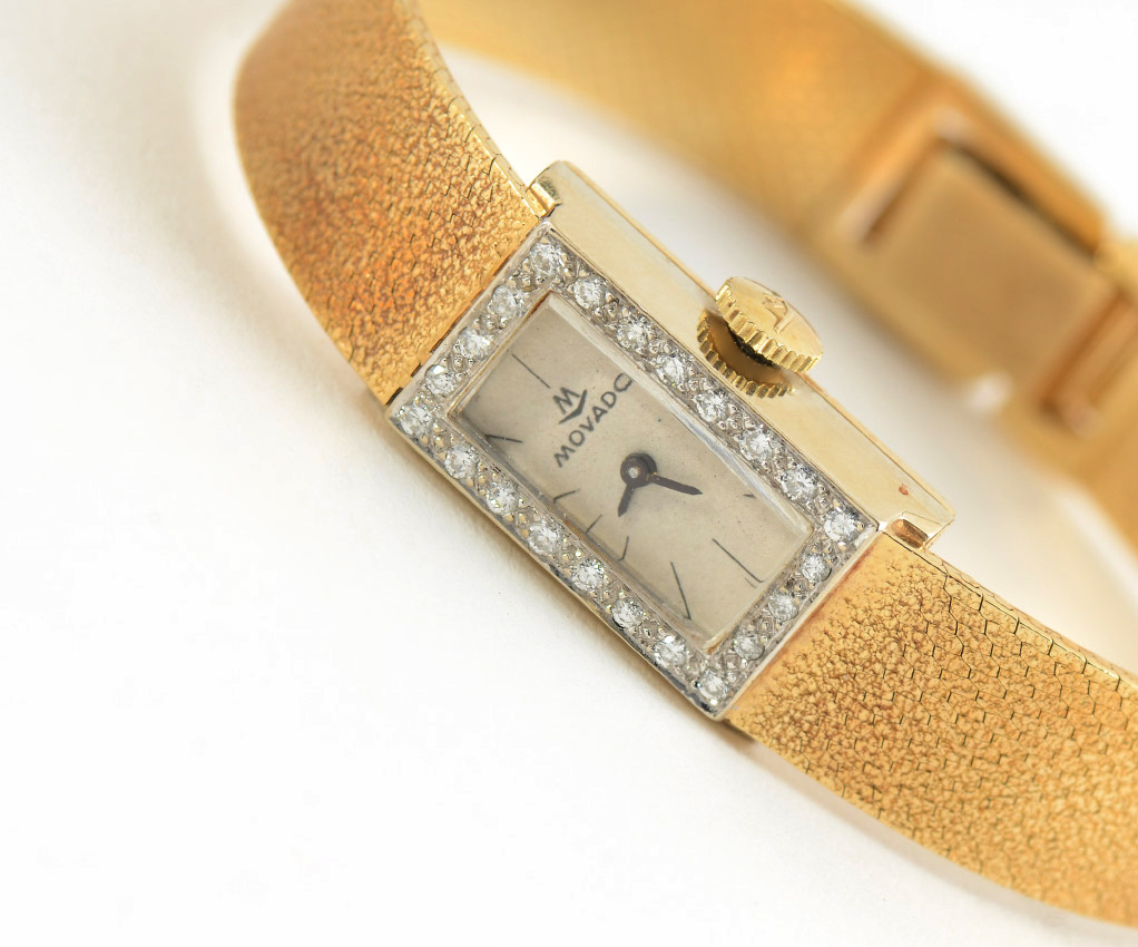 Appraisal: VINTAGE LADIES MOVADO K GOLD WATCH WITH DIAMONDS Serpentine flexible