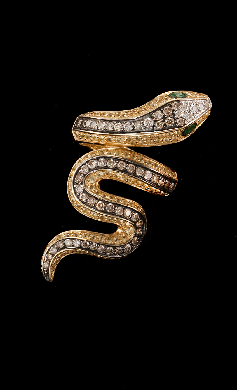 Appraisal: KT YELLOW GOLD DIAMOND EMERALD AND TOPAZ SERPENT RING With