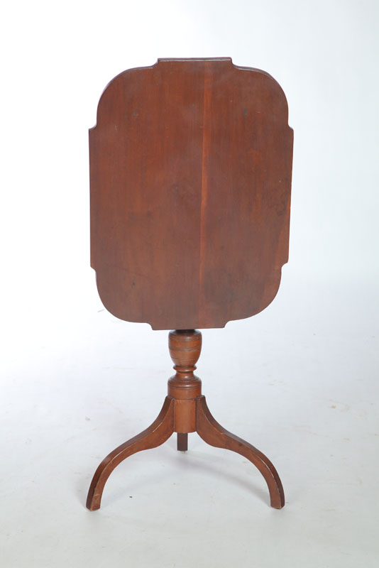 Appraisal: CANDLESTAND American st quarter th century cherry Shaped two board