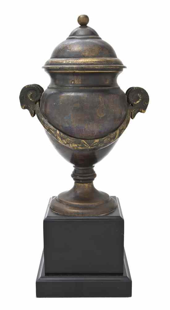 Appraisal: A Continental Bronzed Metal Covered Urn the baluster body with