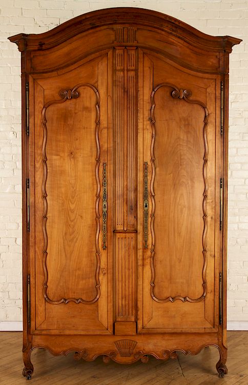 Appraisal: TH C FRENCH CHERRY ARMOIRE ARCHED TOP An elegant nineteenth