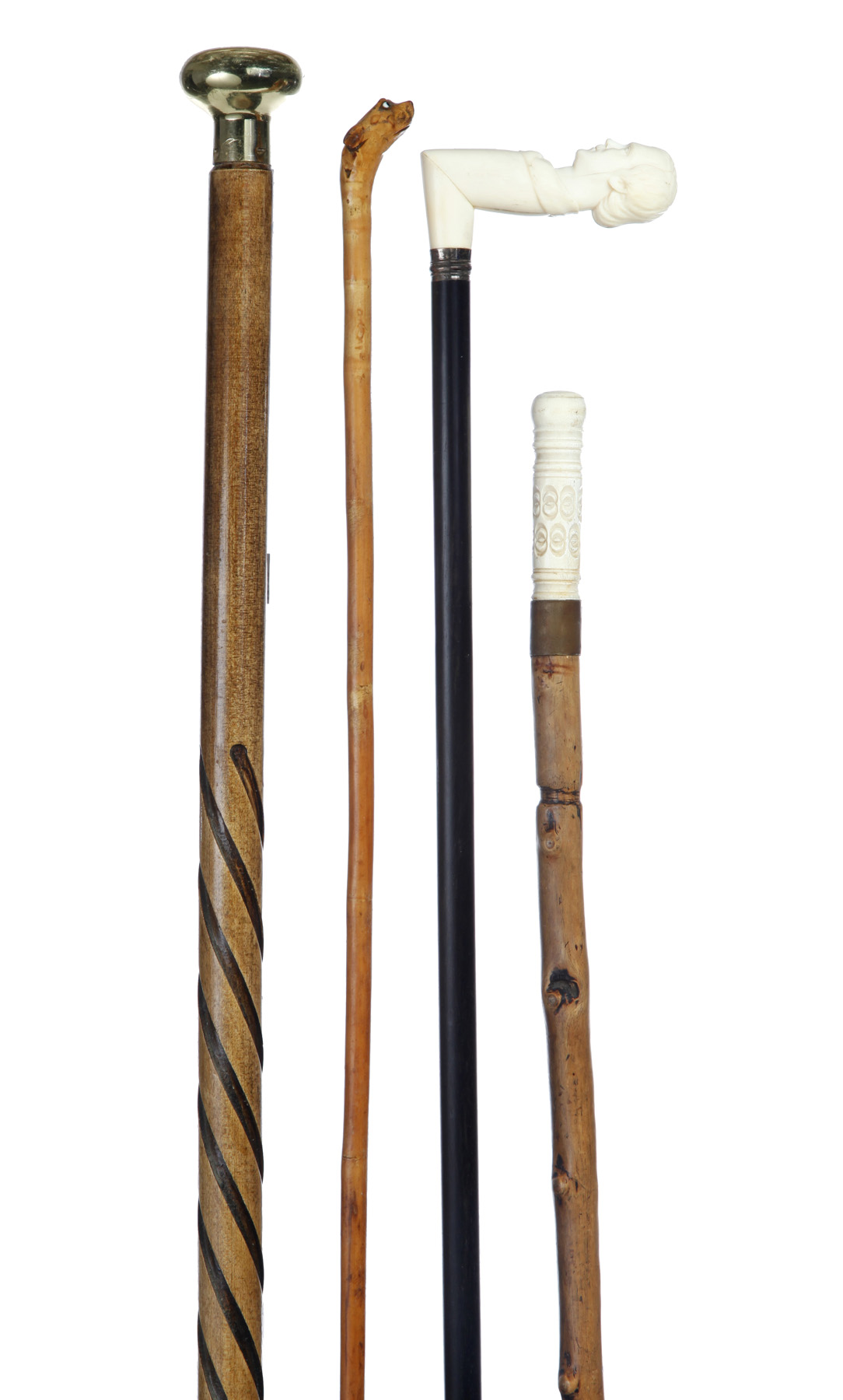 Appraisal: FOUR CANES AND WALKING STICKS American th- th century Wooden