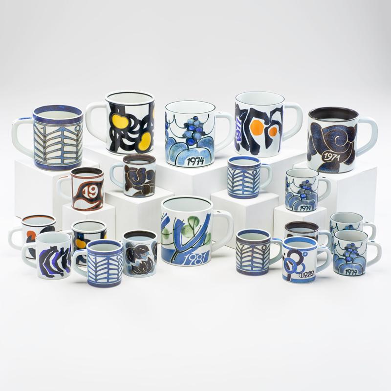 Appraisal: ROYAL COPENHAGEN Twenty faience mugs from the Annual Series fourteen