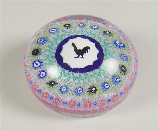 Appraisal: Baccarat Paperweight Rooster medallion in center surrounded by millefiore canes