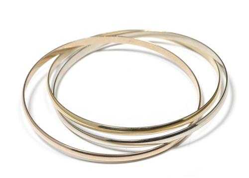 Appraisal: TRINITY BANGLE CARTIER Yellow white and red gold g Ref