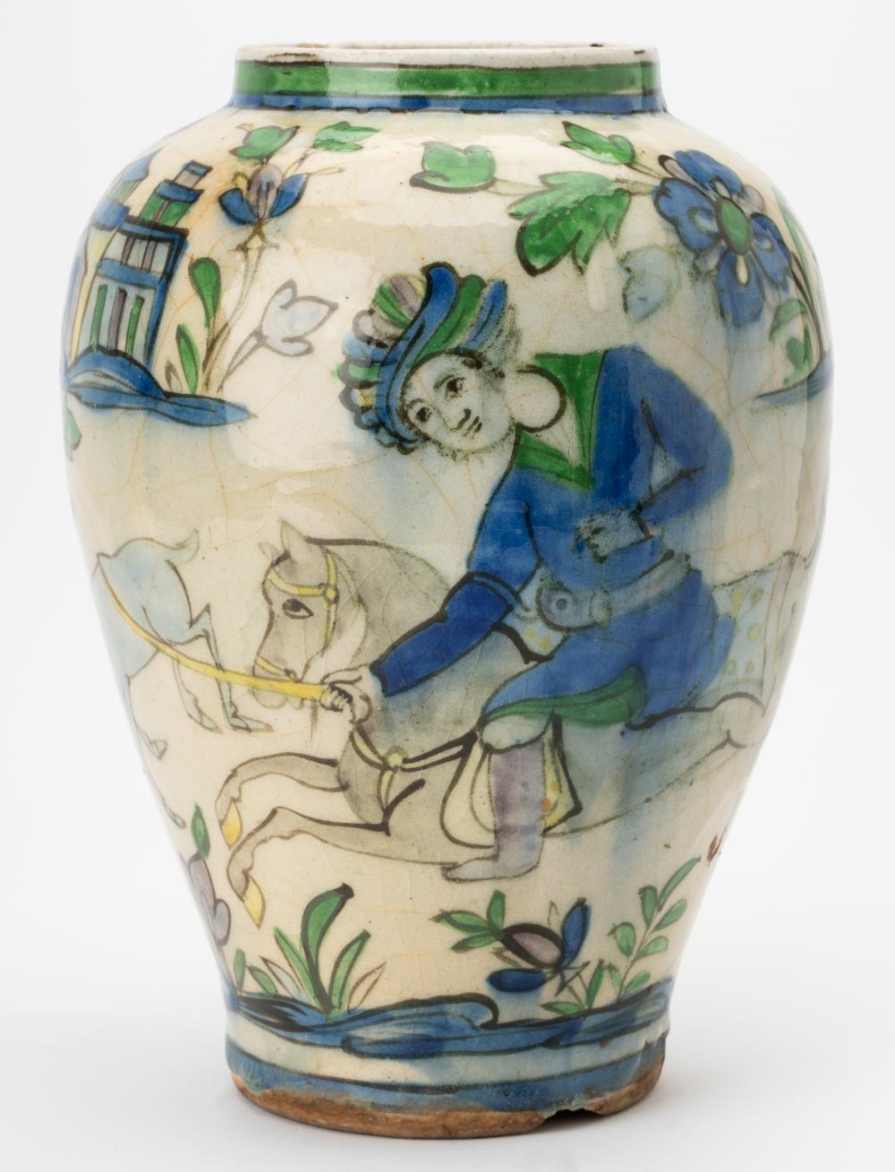 Appraisal: PERSIAN GLAZED CERAMIC VASEdecorated with a man on horseback hunting