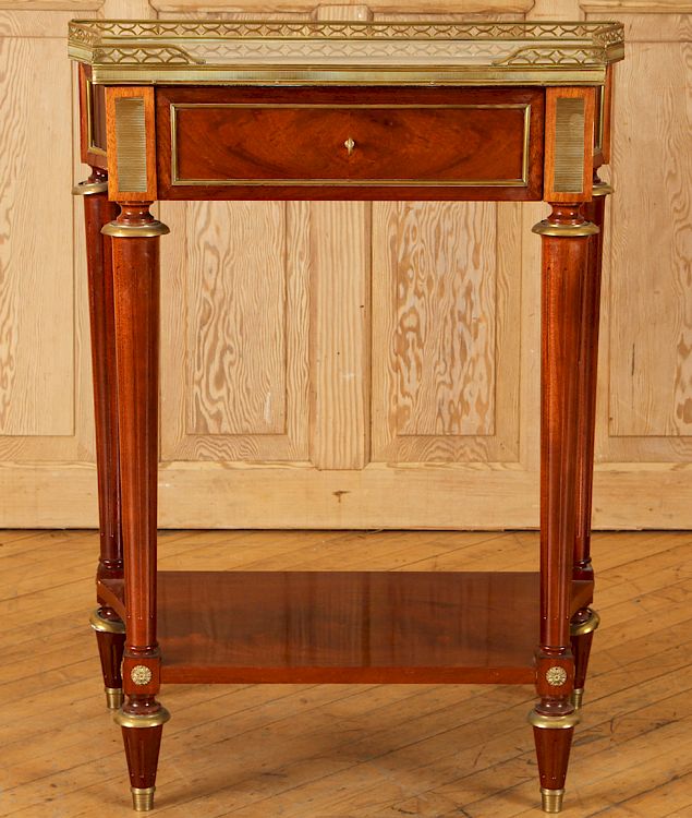 Appraisal: FRENCH MARBLE TOP CROTCH MAHOGANY CONSOLE TABLE A French marble