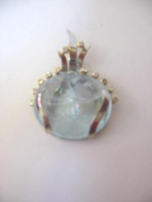 Appraisal: AN AQUAMARINE AND DIAMOND PENDANT the oval aquamarine carved as