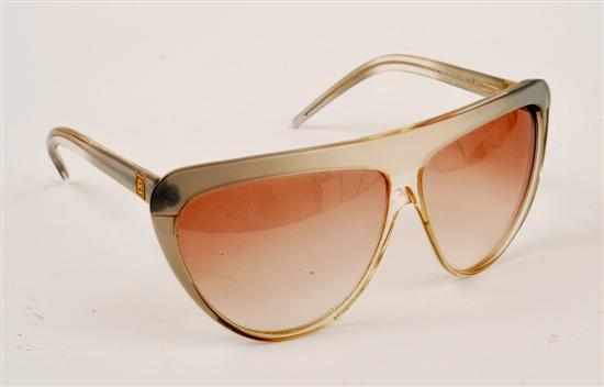 Appraisal: A PAIR OF SUNGLASSES BY LAURA BIAGIOTTI The clear frames