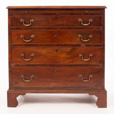 Appraisal: A George III mahogany chest fitted a brushing slide above