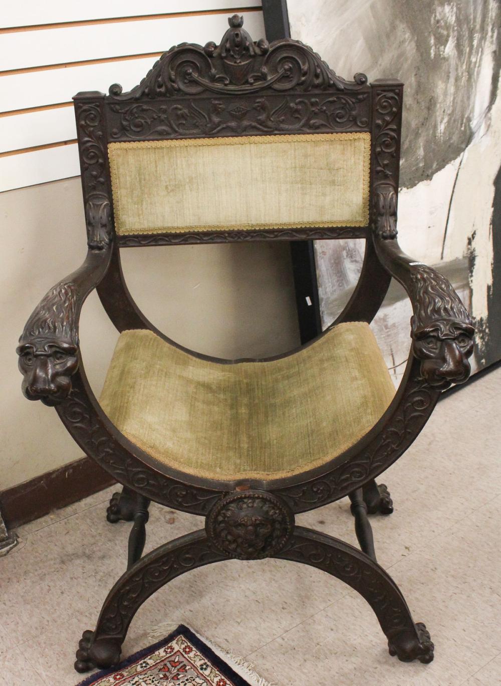 Appraisal: ITALIAN RENAISSANCE STYLE 'SAVONAROLA' ARMCHAIR American c with carved lion