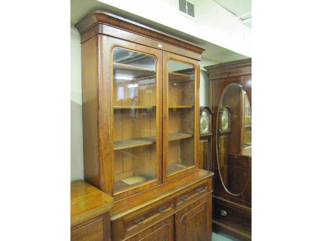 Appraisal: Victorian mahogany bookcase on cupboard base