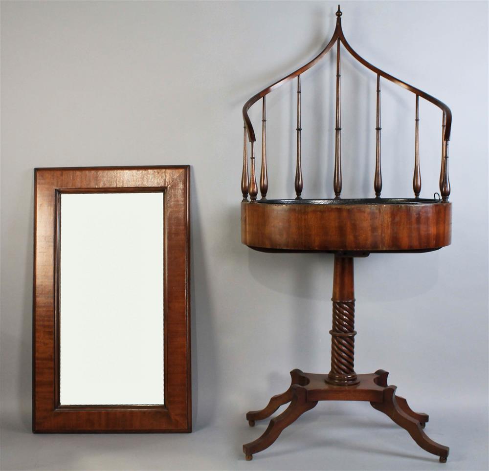 Appraisal: GOTHIC STYLE MAHOGANY PLANTER AND MAHOGANY WALL MIRROR the planter