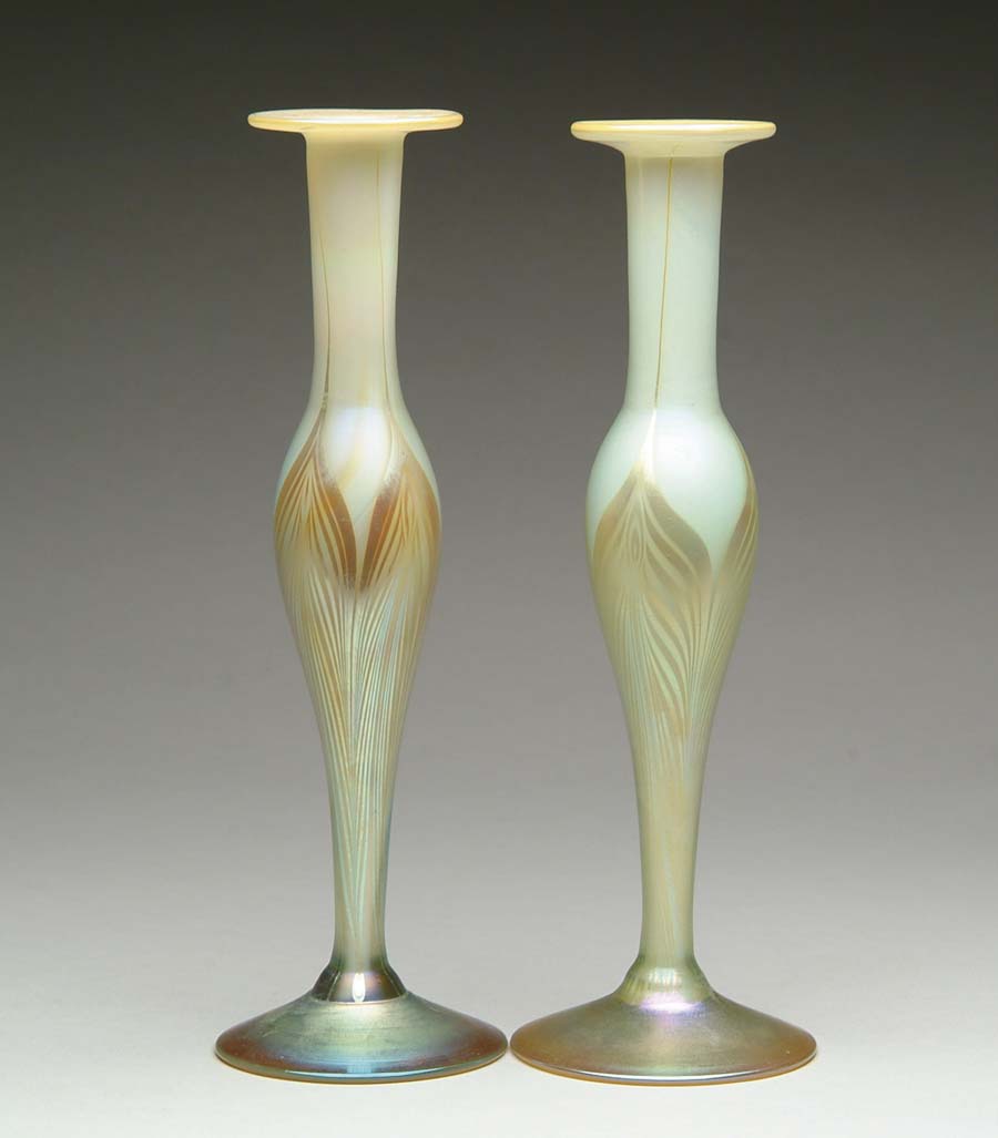 Appraisal: PAIR OF ART GLASS VASES Tall slender vases have gold