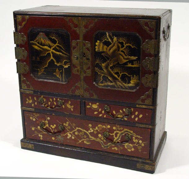 Appraisal: Japanese lacquered cabinet fitted a pair of metal mounted cupboard