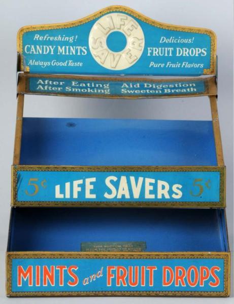 Appraisal: Tin Lifesaver Fruit Mints Store Display Description Embossed top marquee