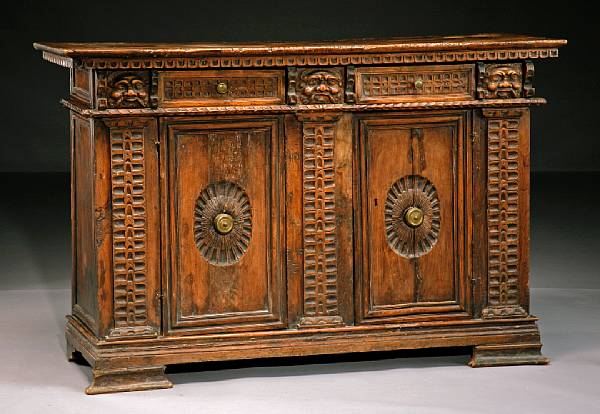 Appraisal: An Italian Baroque walnut credenza late th century The rectangular