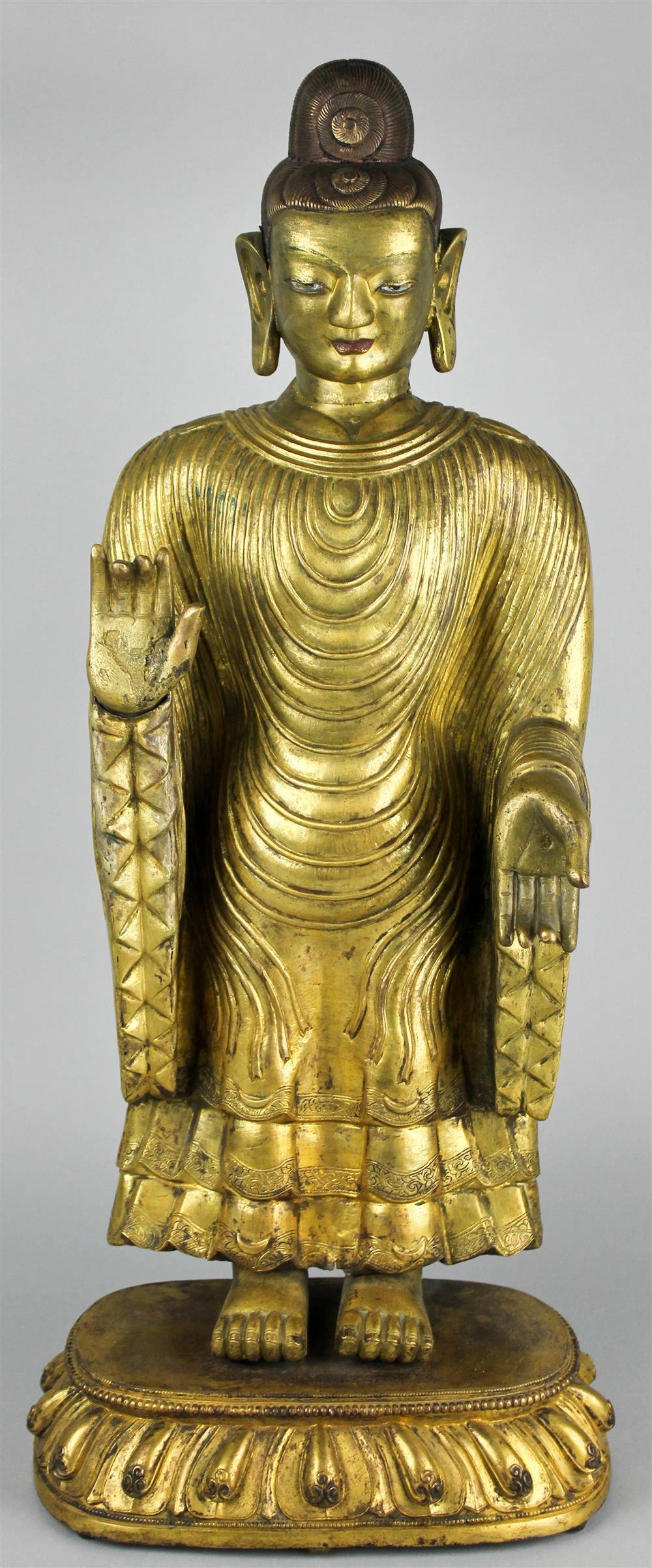 Appraisal: MONGOLIAN GILT METAL STANDING FIGURE OF THE BUDDHA EARLY TH