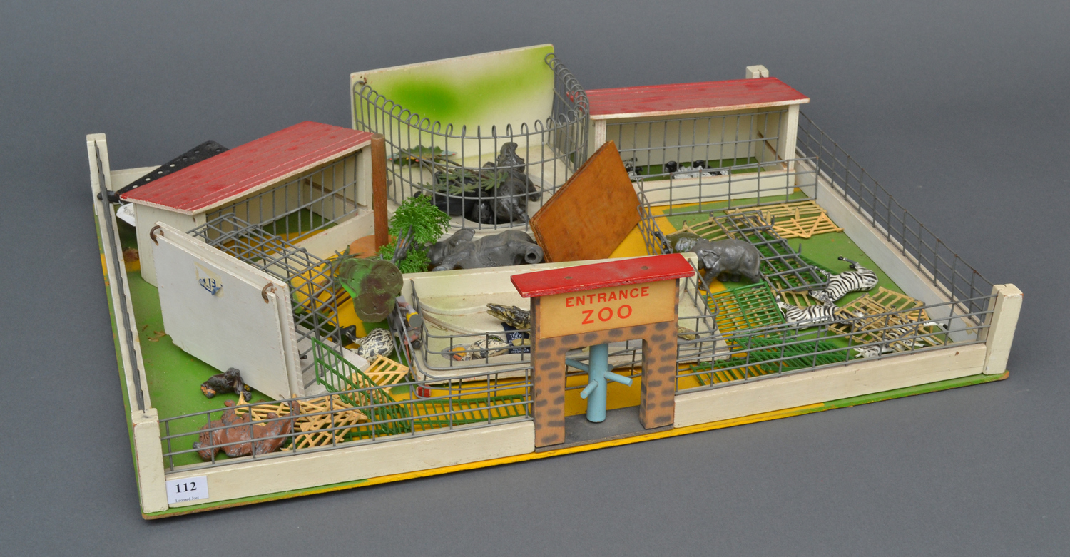 Appraisal: A DETAILED MODEL OF A WILDLIFE ZOO IN PAINTED WOOD