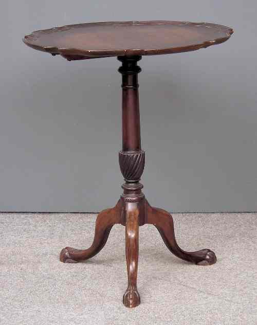 Appraisal: A mahogany circular tripod table of Georgian design the top