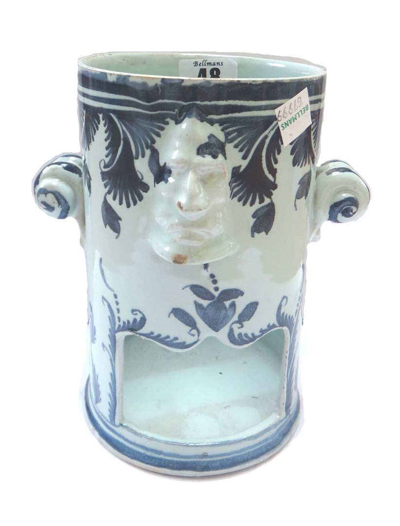 Appraisal: A London delftware blue and white section from a foodwarmer