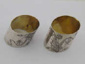 Appraisal: A pretty pair of Russian silver napkin rings engraved with