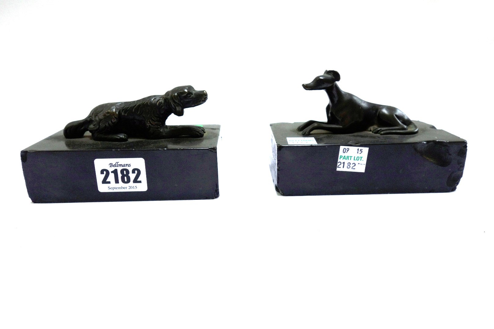 Appraisal: Two Regency bronze and black slate desk weights each bronze