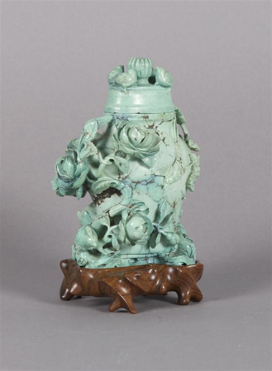 Appraisal: A Carved Turquoise Vase and Lid Height of vase inches