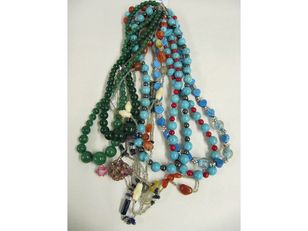 Appraisal: Lot comprising two strings of jade beads three strings of