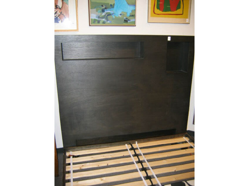 Appraisal: HEADBOARD AND FRAME Chocolate wood bed with square form headboard