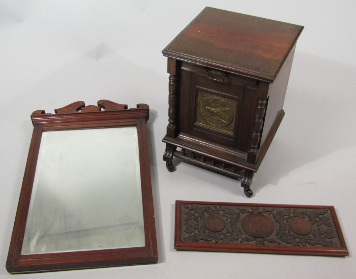 Appraisal: An Edwardian oak stained coal perdonium of square outline with