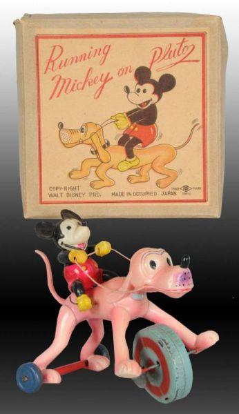 Appraisal: Occupied Japanese Mickey Mouse on Pluto Toy Description Celluloid running