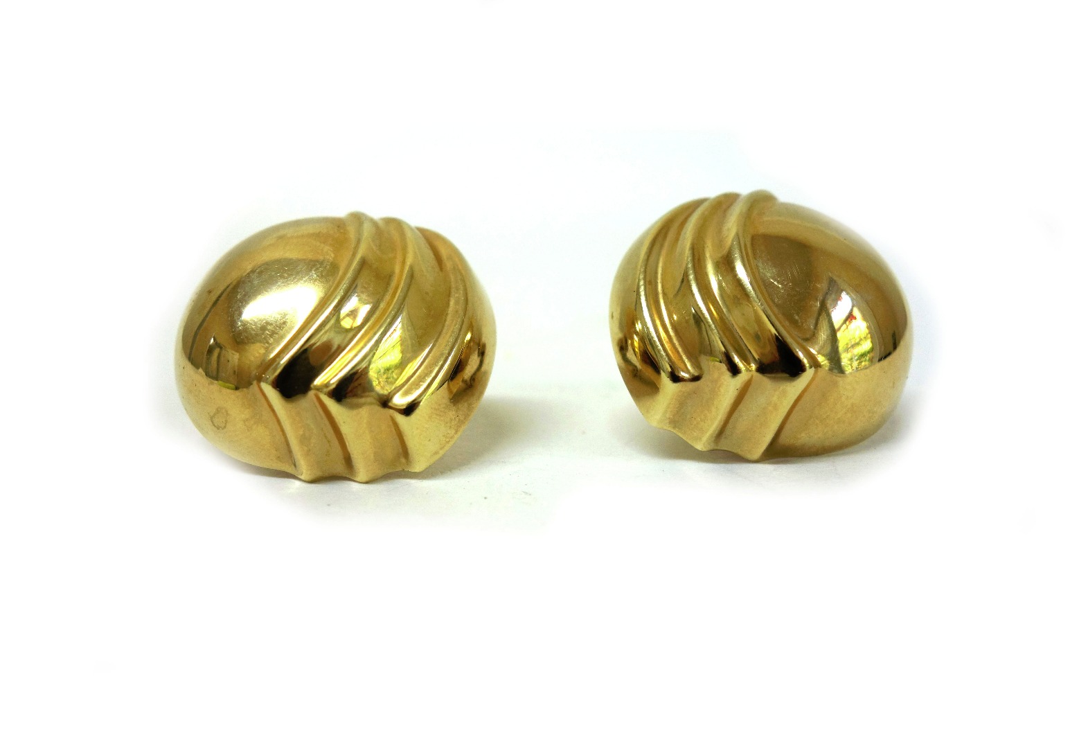 Appraisal: A pair of Italian hollow gold embossed circular earrings by