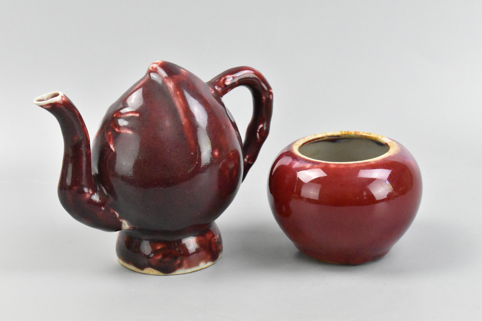 Appraisal: A Chinese Oxblood glazed porcelain teapot in the shape of