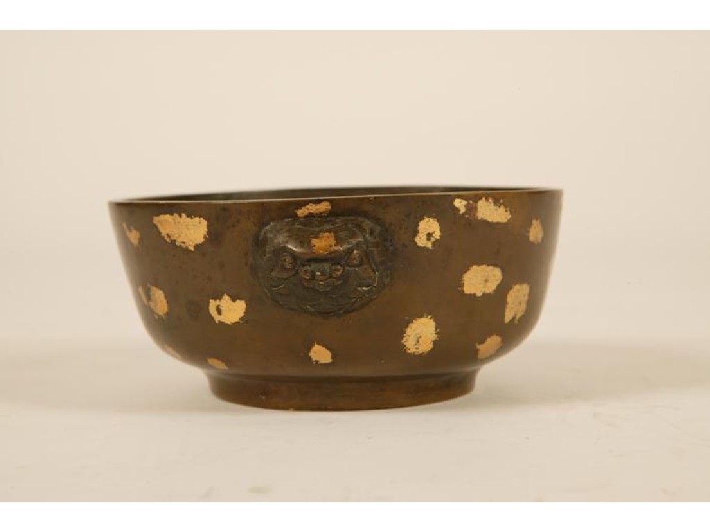 Appraisal: A CHINESE BRONZE AND GOLD-SPLASH BOWL of plain form with