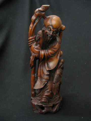 Appraisal: Chinese Carved Rosewood Figurineof an Immortal ''