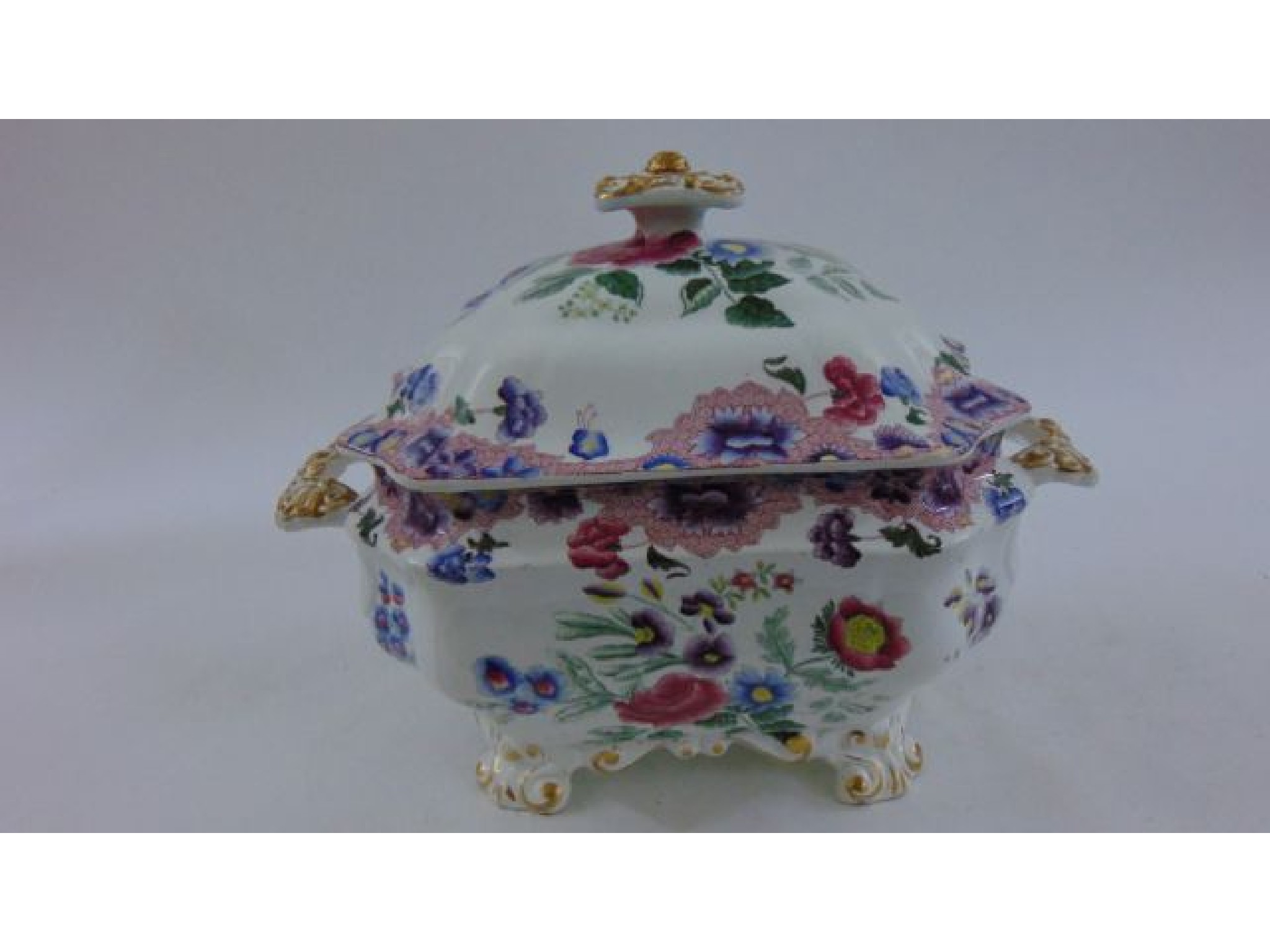 Appraisal: An ironstone tureen and cover with printed and infilled floral